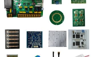 Collection of electronic circuit boards and components including PCBs, relays, and connectors for prototyping.